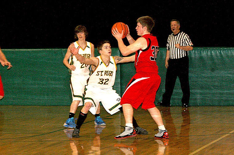 &lt;p&gt;Tigers top scorer Dakota Wickham guards an opposing player during a St. Regis home game.&#160;&lt;/p&gt;