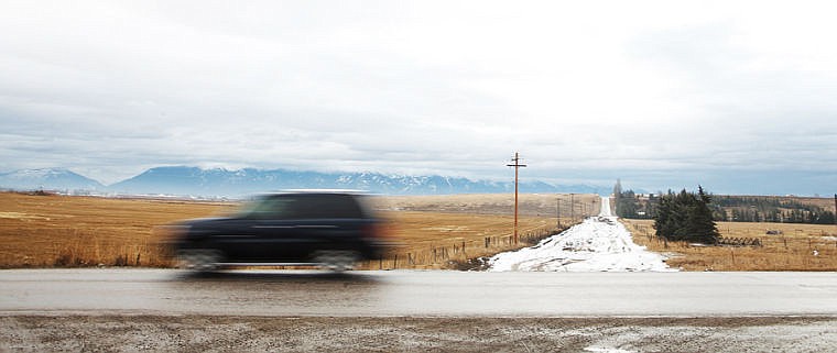 &lt;p&gt;A car driving on Stillwater Road passes Four Mile Drive on Wednesday morning. Wednesday, March 13, 2013 in Kalispell, Montana. (Patrick Cote/Daily Inter Lake)&lt;/p&gt;