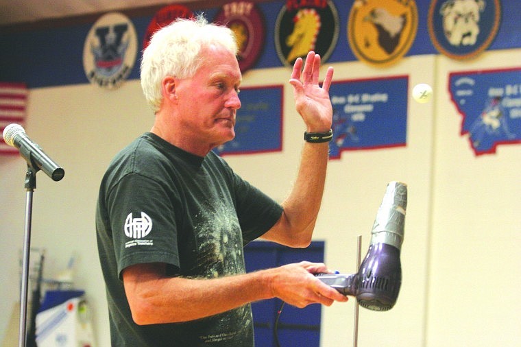 Glenn Govertsen demonstrates a physic principal as the ball hovers over the hair dryer even though its tipped slightly to the side.