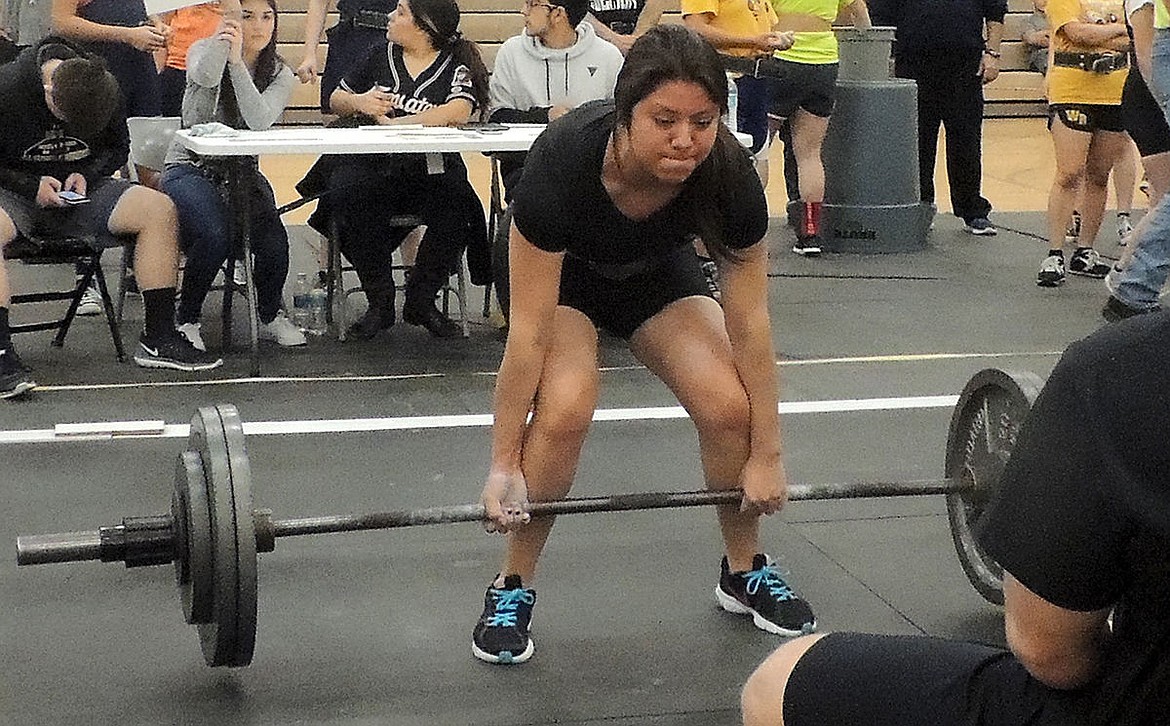 Lesly Martinez, who is becoming a legend in prep power lifting, dead lifts 280 pounds.