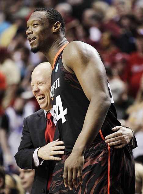 &lt;p&gt;Cincinnati head coach Mick Cronin hugs forward Yancy Gates (34) in the final seconds of their 62-56 win over Florida State in a third-round NCAA college basketball tournament game on Sunday, March 18, 2012, in Nashville, Tenn. (AP Photo/Mark Humphrey)&lt;/p&gt;