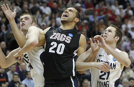 &lt;p&gt;Gonzaga forward Elias Harris (20) fights for position in the lane against BYU center James Anderson (15) and BYU forward Stephen Rogers (21) in the first half of a Southeast regional third round NCAA tournament college basketball game, Saturday at Denver.&lt;/p&gt;