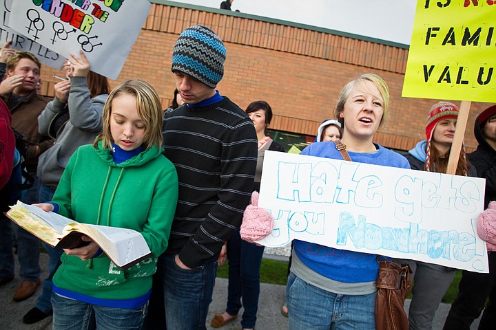 &lt;p&gt;North Idaho College students, Kristen Smith and Coedy Labolle read versus from the Bible as shouts with counter protestors Friday on the NIC campus. Several hundred turned out in opposition to a small group of Westboro Baptist Church protestors from Topeka, Kansas who were in the area to demonstrate against homosexuality.&lt;/p&gt;