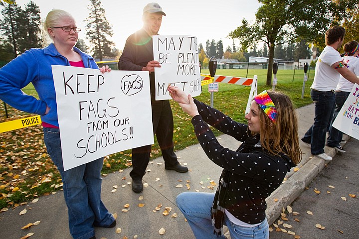 &lt;p&gt;Carly Demers, of Spokane, is ignored as she proposes to Christine Newman, of Spirit Lake, during a demonstration in Coeur d'Alene. Newman and her brother-in-law, Shaun Winkler, center, attended the protest in support of the Westboro Baptist Church group's view on the homosexual lifestyle.&lt;/p&gt;