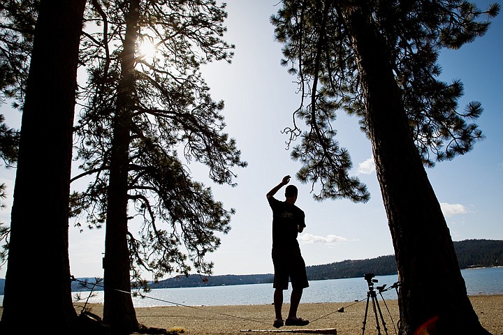 &lt;p&gt;Colton Wanner, a senior at Lake City High, uses his arms to keep balance as he walks a slack line Thursday near the Coeur d'Alene City Beach. Wanner was video-taping himself on the line as part of a multimedia class.&lt;/p&gt;