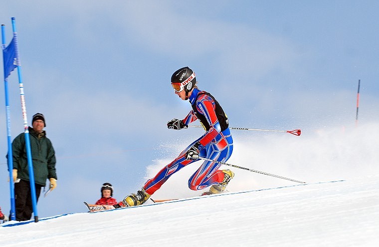 Jeffrey Gay of Steamboat Springs, Colo. starts a turn around a gate Friday during the second day of competition at the U.S. Telemark Nationals at Whitefish Mountain Resort. Friday&#146;s one-run event included slalom gates, a jump, a 360-degree banked turn as well as Nordic skating.