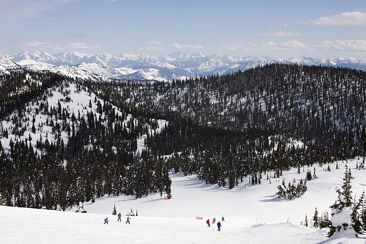 &lt;p&gt;With a view of Glacier National Park in the distance, skiers and snowboarders make their way down Moe Mentum Run at Whitefish Mountain Resort on Saturday afternoon. The resort has 106 inches of snow at the summit of Big Mountain with more snow predicted this week.&lt;/p&gt;