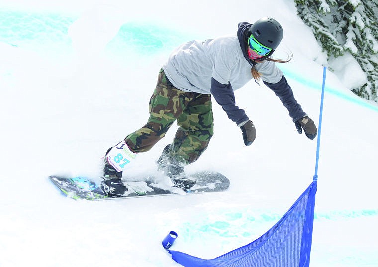 &lt;p&gt;Emilie Scollan of Whitefish carves around a gate during the Nate Chute banked slalom races on Saturday at Whitefish Mountain Resort.&lt;/p&gt;