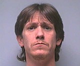 Kennewick murder suspect at large