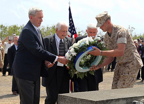 &lt;p&gt;U.S. veterans offer a wreath during a ceremony commemorating the 70th anniversary of the Battle of Iwo Jima on Iwo Jima, Saturday on the island now known officially as Ioto, Japan. Dozens of aging U.S. veterans gathered on the tiny, barren island of Iwo Jima on Saturday to mark the 70th anniversary of one of the bloodiest and most iconic battles of World War II.&#160;&lt;/p&gt;