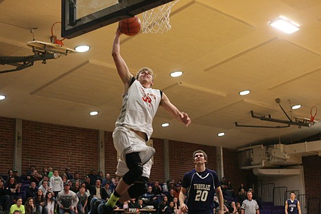 &lt;p&gt;Post Falls' Corey Koski goes up for the break-away slam during the second half of the 28th annual District 1 Basketball All-Star Game at the Mullan Athletic Pavilion Friday night.&lt;/p&gt;