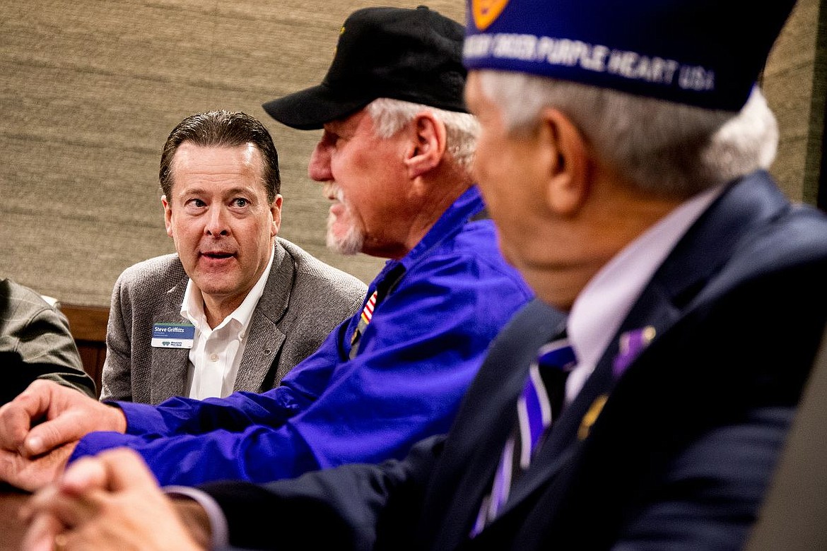 &lt;p&gt;The City of Hayden Mayor Steve Griffitts, left, chats with Bill Hamilton and Donald Turano, both Vietnam War veterans who received the Purple Heart, on Tuesday before the veterans were given commemorative Buck sheath knives at the Coeur d'Alene Press office.&lt;/p&gt;
