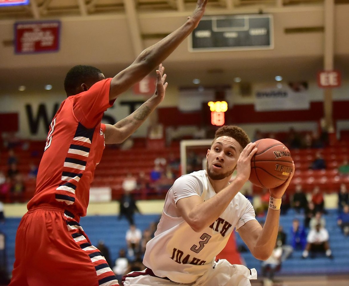 &lt;p&gt;ANDREW WHITAKER/The Hutchinson News&lt;/p&gt;&lt;p&gt;North Idaho College Trey Burch-Manning (3) looks to pass during the NJCAA men's national basketball tournament game between North Idaho College and Southwest Tennessee Tuesday, March 15, 2016 at Hutchinson Sports Arena in Hutchinson.&lt;/p&gt;