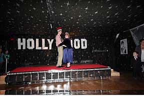 Prom King, Andrew Baker, and Queen, Deanna Roseberry, enjoy a dance in the limelight on Saturday evening.