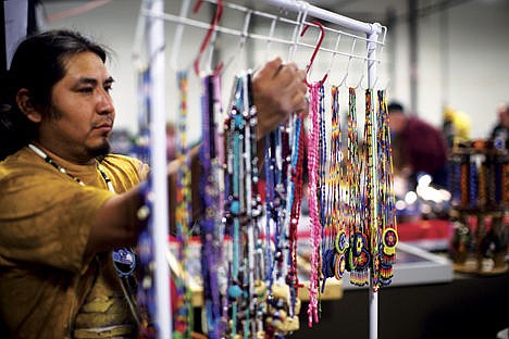 &lt;p&gt;Christopher Villa displays his beadwork Saturday at the Kootenai County Fairgrounds. Villa spends 3-4 hours making each necklace and travels as far as Utah to sell them.&lt;/p&gt;