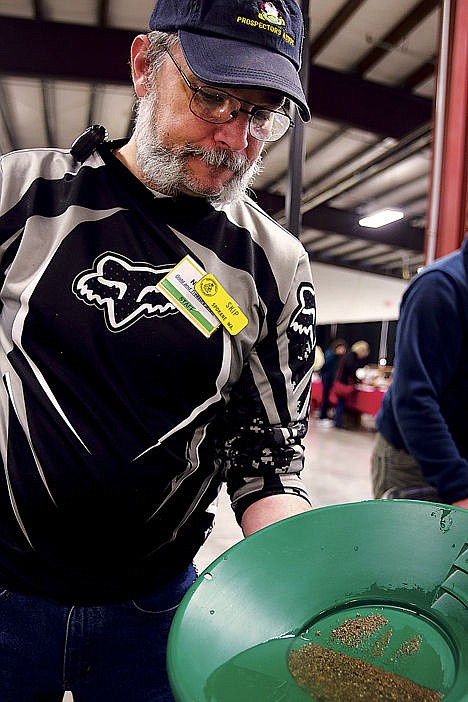 &lt;p&gt;Kenny Lindahl locates some shimmer in his gold pan at the Gold and Treasure show Saturday.&lt;/p&gt;