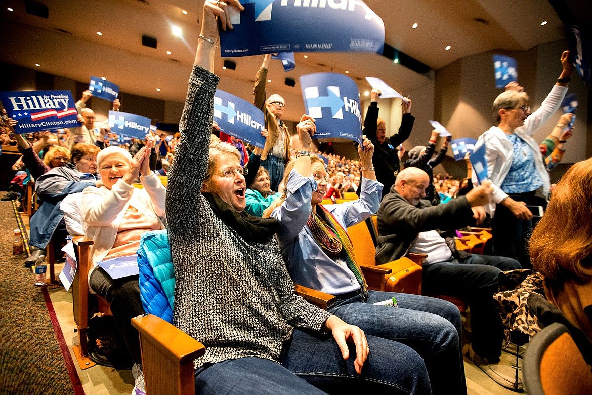 &lt;p&gt;April Winters, center left, sits next to Tracey Sutton as they cheer to support democratic presidential candidate Hillary Clinton on Tuesday at the democratic caucus held at North Idaho College.&lt;/p&gt;