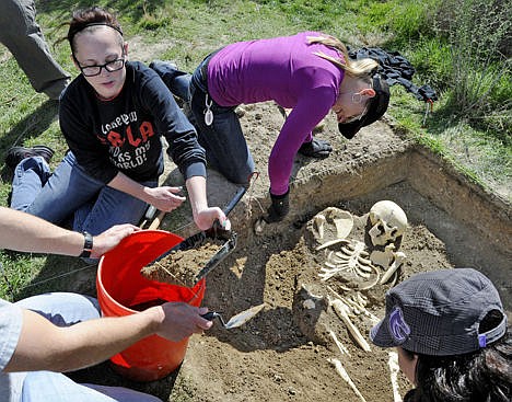 &lt;p&gt;Elizabeth Herink, with the Ada County Sheriffs Office, left, and Sara Hill, a Boise City Police CSI, excavate a plastic skeleton during a forensic anthropology class Friday at Celebration Park in Melba, Idaho. The two day class was attended by about 20 students that are law enforcement officials and medical examiners. The class helps give a better understanding of how to properly excavate a site with human remains.&lt;/p&gt;