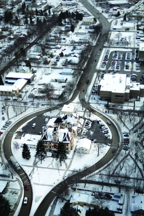 <p><strong>THIS 2011 AERIAL</strong> view looks south past the Flathead County Courthouse, showing the road couplet around the courthouse complex. </p>