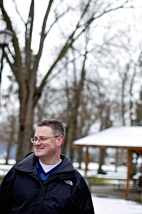 &lt;p&gt;Mark Fisher, who moved from Coeur d'Alene 20 years ago to live overseas, walks through City Park in downtown to enjoy the natural surroundings Friday.&lt;/p&gt;