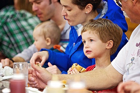 &lt;p&gt;Kahrs Bemis, 4, enjoys a burger at Hudson's Hamburgers during a lunchtime stop Friday. Hudson's counter is a popular eatery in the Lake City for locals as well as transplants.&lt;/p&gt;