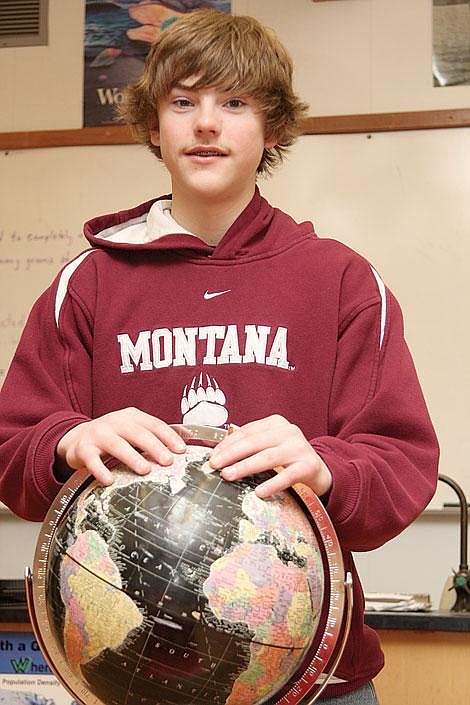 Photo by Aaric Bryan Plains eighth-grader Carter Montgomery is on top of the world after qualifying for the state geography bee.