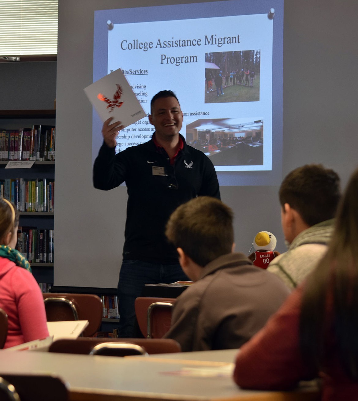 Noe Valdovinos, an outreach specialist for Eastern Washington Universitys CAMP program, speaks to middle school students of migrant families from all three of Moses Lakes middle schools about being ready for college. The presentation was Wednesday at Frontier Middle School.