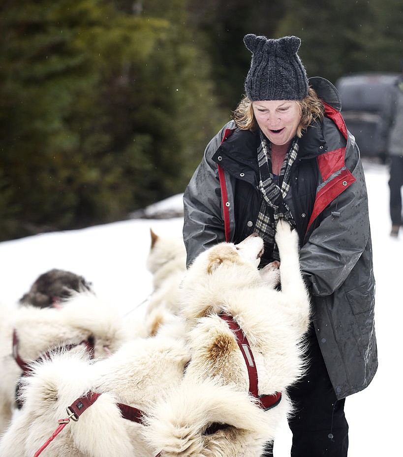 &lt;p&gt;Ali Gilmore pets some of the Base Camp Bigfork Inuit sled dogs after a ride at Porcupine Creek in the Swan Valley on Thursday. (Aaric Bryan/Daily Inter Lake)&lt;/p&gt;