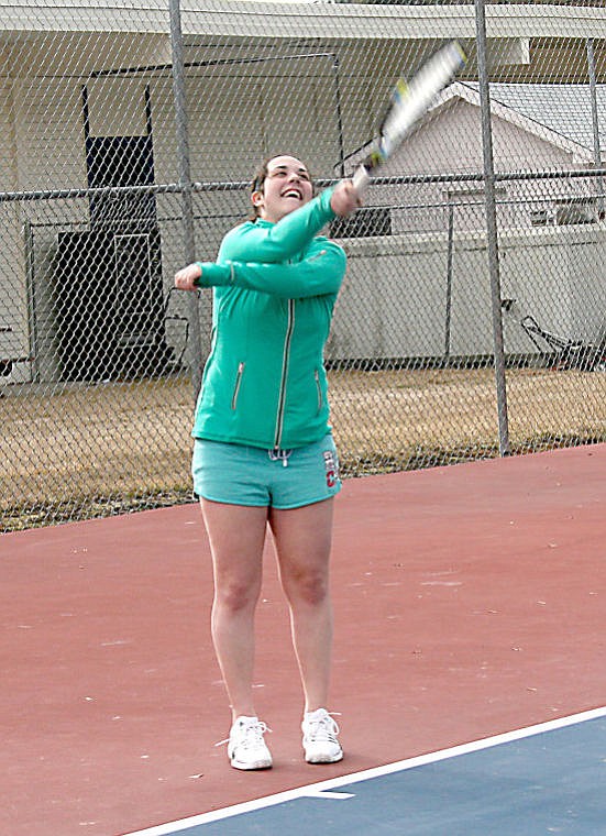 <p>Alberton Senior Hailie Bahm serves the ball during a practice session of the Alberton-Superior tennis team. </p>