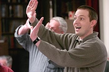 Flathead Valleyaire Charles Peterson practices his hand movements with a song the barbershop chorus will perform Saturday at its 37th annual show, &quot;Everything Old Is New Again,&quot; at Flathead High School. The show raises money for scholarships for high school seniors who plan to study music in college. Allison Money/Daily Inter Lake