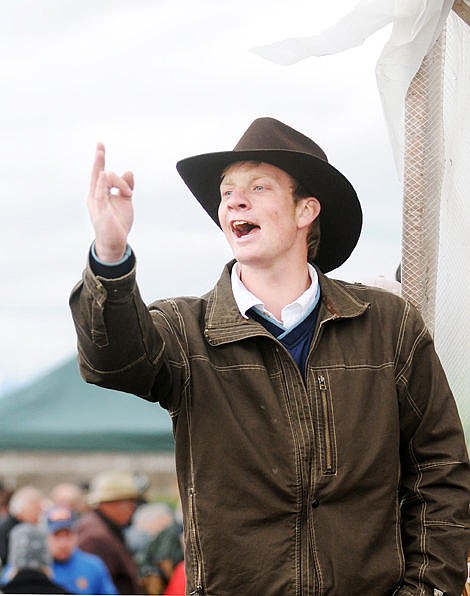 &lt;p&gt;Caleb Troyer takes bids during the 49th annual Creston Auction on Saturday. (Aaric Bryan/Daily Inter Lake)&lt;/p&gt;