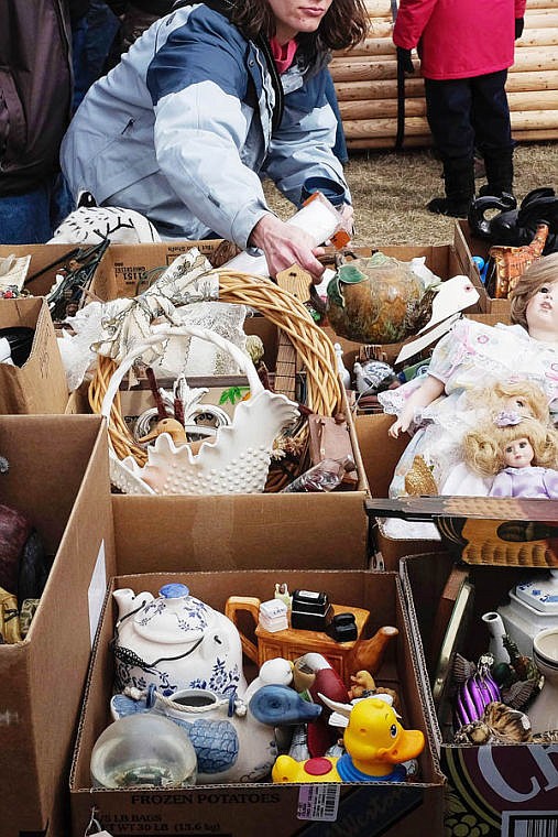 &lt;p&gt;A woman inspects a teapot Saturday morning during the 48th Annual Creston Auction. April 5, 2014 in Creston, Montana. (Patrick Cote/Daily Inter Lake)&lt;/p&gt;