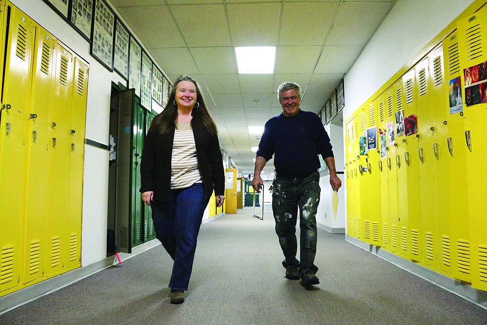 &lt;p&gt;John Pienciak, right, walks down the hall of St. Regis High School with Superintendent Judy McKay.&lt;/p&gt;