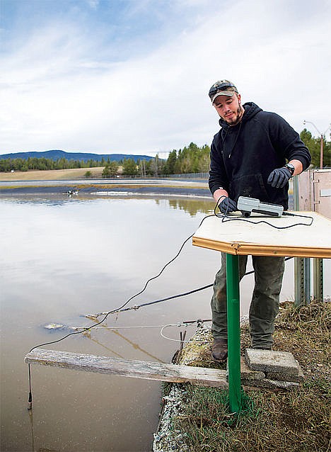 &lt;p&gt;Anthony Brandt, operator in training with Spirit Lake Sewage , takes a pH reading from pond 1 on March 20 at the sewage lagoon in Spirit Lake. Once the wastewater has gone through a series of filtration systems it will be used in the growing of alfalfa.&lt;/p&gt;