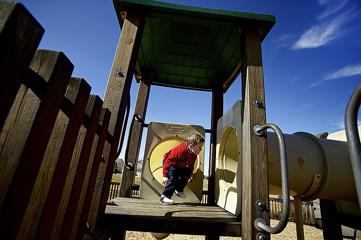 &lt;p&gt;&lt;span&gt;JEROME A. POLLOS/PressKnox Keogh, 3, races through the play structure at Bluegrass Park in Coeur d'Alene during an outing with his family Monday.&lt;/span&gt;&lt;/p&gt;