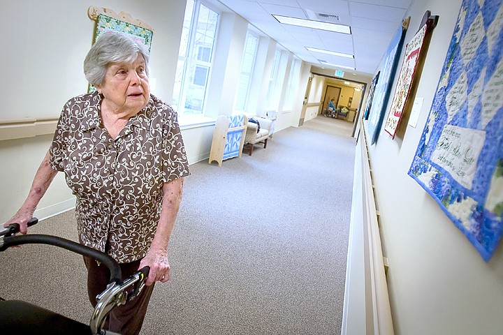 &lt;p&gt;JULIA MOORE/Press Dorothy Todd, a resident of Coeur d'Alene Homes, looks at the &quot;Quilt Walk&quot; Thursday afternoon.&lt;/p&gt;