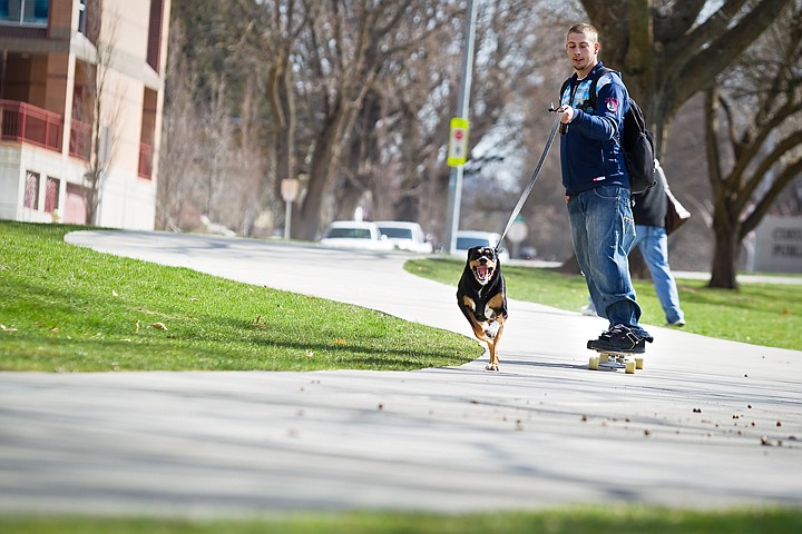 &lt;p&gt;SHAWN GUST/Press Nick Turner runs his dog, Lola, while riding a longboard Wednesday near McEuen Field in Coeur d'Alene. Lola, the two-year-old Rottweiler mix, obeys commands for right and left-hand turning and will even stop at stop signs.&lt;/p&gt;