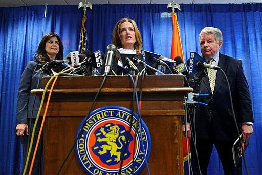 &lt;p&gt;Nassau County District Attorney Kathleen Rice, Center, is joined by Kathryn Juric, Vice President of the College Board for the SAT Program, left, and Jon Erickson, President of ACT Education, right, as she announces a national test security overhaul to prevent cheating on on the SAT exams, Tuesday, March 27, 2012 in Mineola, N.Y. As part of the enhanced security, students taking U.S. college entrance exams this fall will have to submit photo IDs with their applications. (AP Photo/Newsday, Howard Schnapp)&lt;/p&gt;