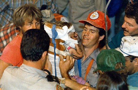 &lt;p&gt;Rescue workers carry 18-month-old Jessica McClure to safety in Midland, Texas, in October 1987 after she was trapped for 58 hours after she plunged 22 feet into an abandoned water well.&lt;/p&gt;