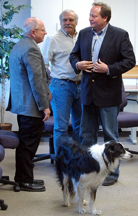 State Rep. Bill Jones, R-Bigfork, left, talks with Gov. Brian Schweitzer and state Sen. Dan Weinberg, D-Whitefish, at the Flathead City-County Health Department on Wednesday. &#147;There is a large group of people here who don&#146;t have health care. This is not right. Especially when they are children,&#148; Jones said. Jones and Weinberg helped secure $1.29 million in state funding for the Community Health Center in Kalispell.