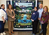 Quilters donate handiwork to ALERT