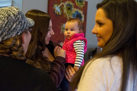 &lt;p&gt;Before leaving for work, Ali Gale and her 6-month-old daughter Evangeline say good-bye to house overseer Adella Eckstein, far right, and another member of the home.&lt;/p&gt;