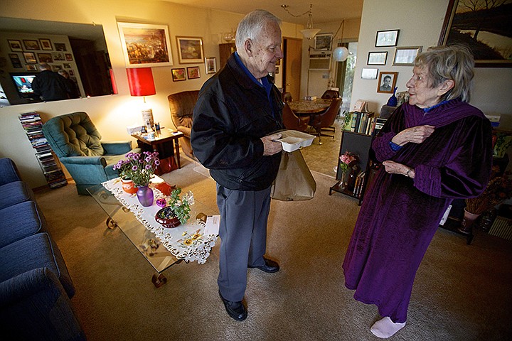 &lt;p&gt;JEROME A. POLLOS/Press Post Falls Mayor Clay Larkin introduces himself to Vic Waltman as he makes a Meals on Wheels delivery Wednesday. Larkin was one of the few mayors in Idaho who took part in the national event of Mayors for Meals Day. &quot;I can't believe the mayor is delivering my meals,&quot; Waltman said after learning of Larkin's role in Post Falls. &quot;And he's a good looking mayor too.&quot;&lt;/p&gt;