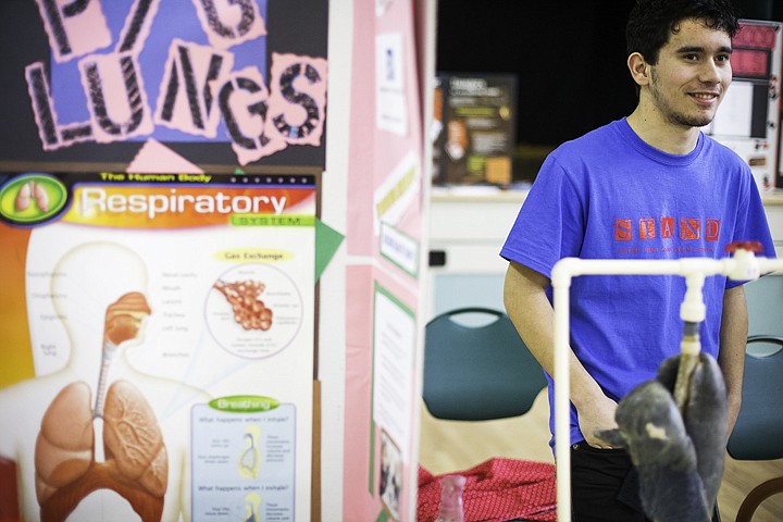 &lt;p&gt;SHAWN GUST/Press Jeremy Ashenbrenner, a junior at Idaho Distance Education Academy, mans his booth showing the affects of smoking on the lungs and the respiratory system Friday at the school's health fair at The Harding Family Center in Coeur d'Alene. The event is part of the larger youth movement against tobacco use called Kick Butts Day, which takes place March 20.&lt;/p&gt;