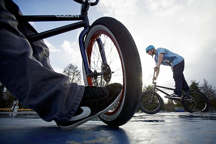 &lt;p&gt;JEROME A. POLLOS/Press Blake Schrock, 16, rolls back onto the half-pipe deck where Zach Todhunder, 16, was waiting Monday at the Coeur d'Alene skate park after finishing a lap through the park on a new bike he received from the U.K. &quot;I waited for two weeks to get this bike, &quot; Schrock said during a break in the rain and snow. &quot;As soon as I got it, I had to take it out no matter what.&quot;&lt;/p&gt;