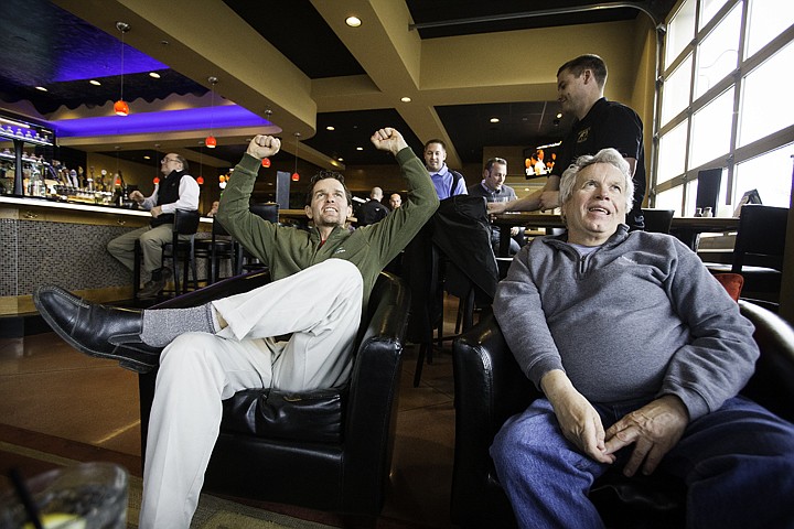 &lt;p&gt;SHAWN GUST/Press Angelo Brunson, left, reacts as Gonzaga University wins in the first round of the NCAA March Madness national championship tournament Thursday after watching the game with Arnold Hogenhout at Season of Coeur d'Alene.&lt;/p&gt;