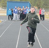 Boys look to defend state track title