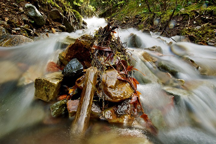 &lt;p&gt;JEROME A. POLLOS/Press Melting snow runoff cascades over rocks in a creek on Canfield Mountain during the 40-plus degree weather Wednesday.&lt;/p&gt;