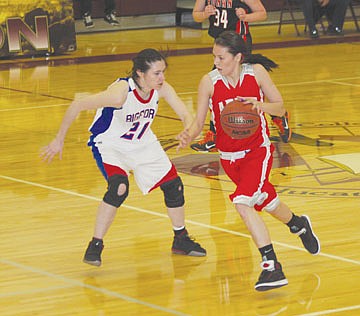 &lt;p&gt;Arlee&#146;s Whitney Malatare drives past Bigfork&#146;s Tessa Robertson in the first half of Friday night&#146;s All-Star game in Pablo.&#160; Malatare finished with 15 points.&#160;&lt;/p&gt;