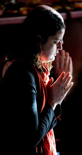 Kelsey Bourn of Seattle&Ecirc;takes part in a Tibetan Buddhist ceremony on Sunday at Ewan Montana in Arlee. Bourn first met Gochen Tulku Sang-ngag Rinpoche in Nepal. When she learned of his visit to Montana she decided to come to Arlee.